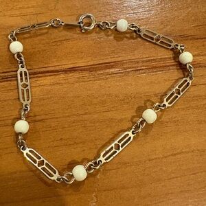 Vintage Avon Gold Tone Link Bracelet with White Beads (c. 1970s–1980s)